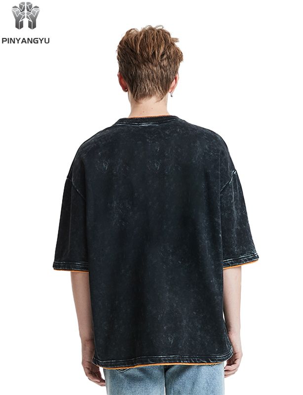 ダメージウォッシュとパッチワークデザインのTシャツ