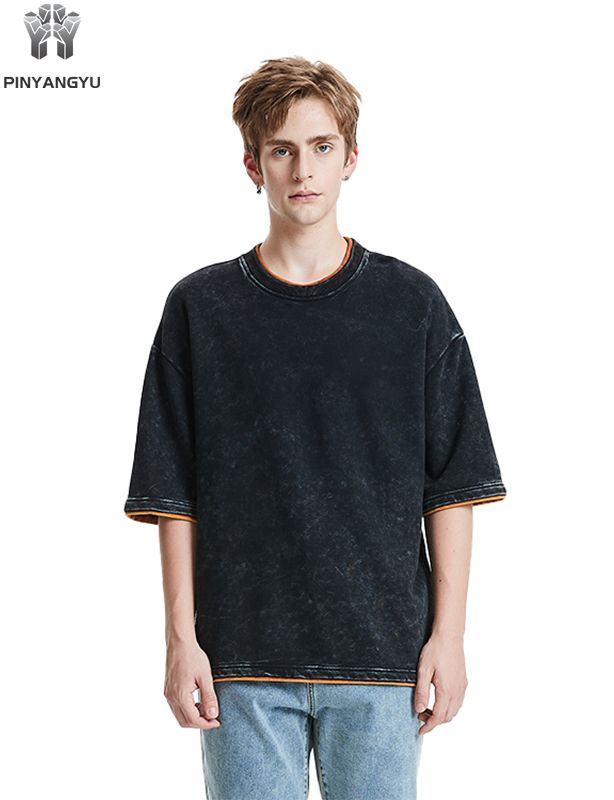 ダメージウォッシュとパッチワークデザインのTシャツ