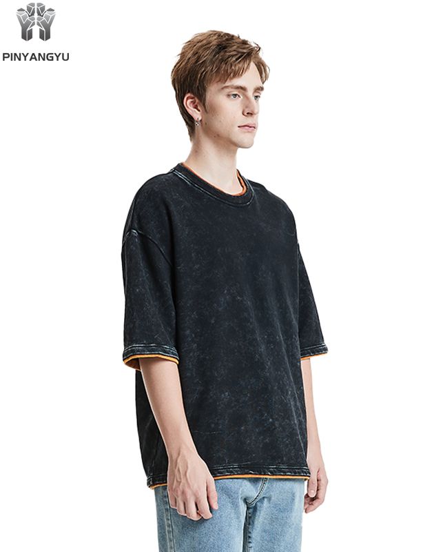 ダメージウォッシュとパッチワークデザインのTシャツ